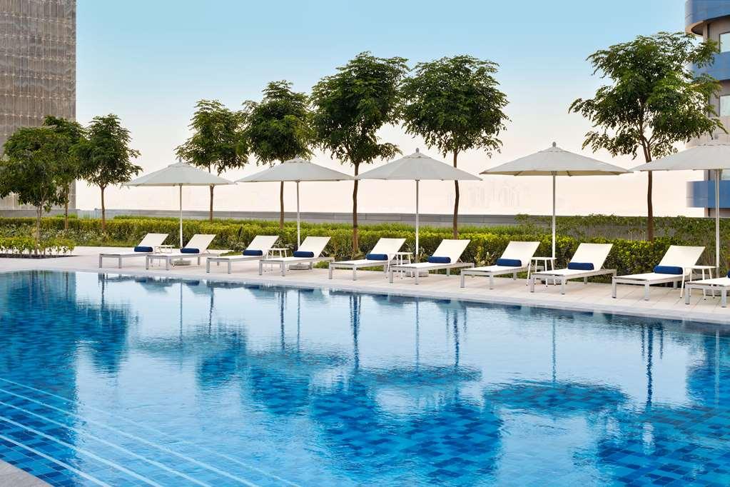 فندق أدريس فاونتن فيوز دبي وسائل الراحة الصورة The swimming pool at the hotel